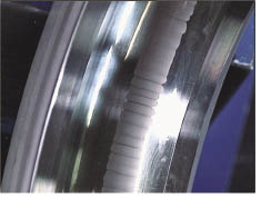 electrical discharge An electrical discharge has found its way to ground through the bearing. The result is a “fluting” pattern on the race. There are many “band-aids” to remedy this situation. You must detect it before fixing it. The easily detected vibration appears in the chart to the right.