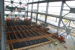 Engineers with Choate Construction will pour 1,900 cubic yards of concrete into a pit 50 feet wide by 100 feet long by 15 feet deep to form the 15-megawatt test rig foundation.