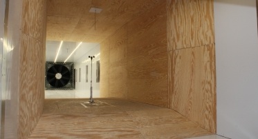 The Burlington wind tunnels have a closed return flow and consist of four parallel tunnels. Each wind tunnel can operate on its own because it forms a closed circuit with its own fan and separate return flow. The test section of each wind tunnel is 3 x 3 m.