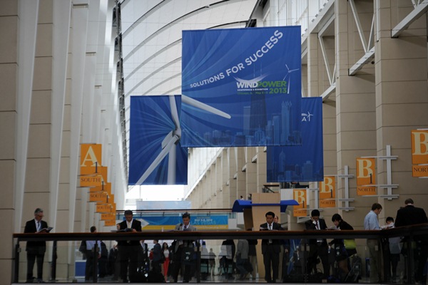 Attendees wait for the floor to open and peruse the show daily. “Solutions for Success” is AWEA’s theme for the exhibition.