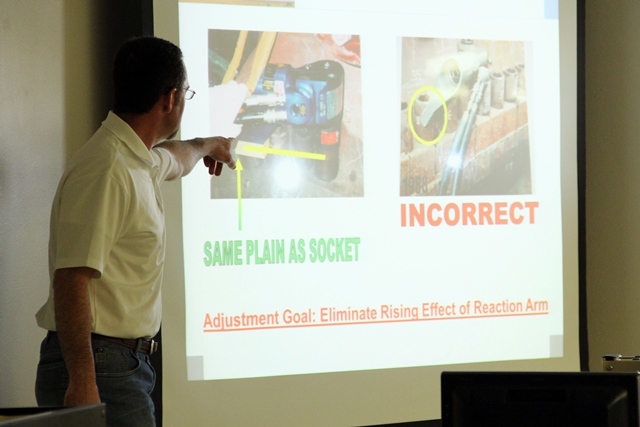 ____, of Hytorc, discusses bolting with wind technicians in a classroom session.