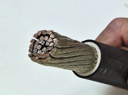 For installing a compression connector, the wire insulation must be stripped carefully to protect the conductors.