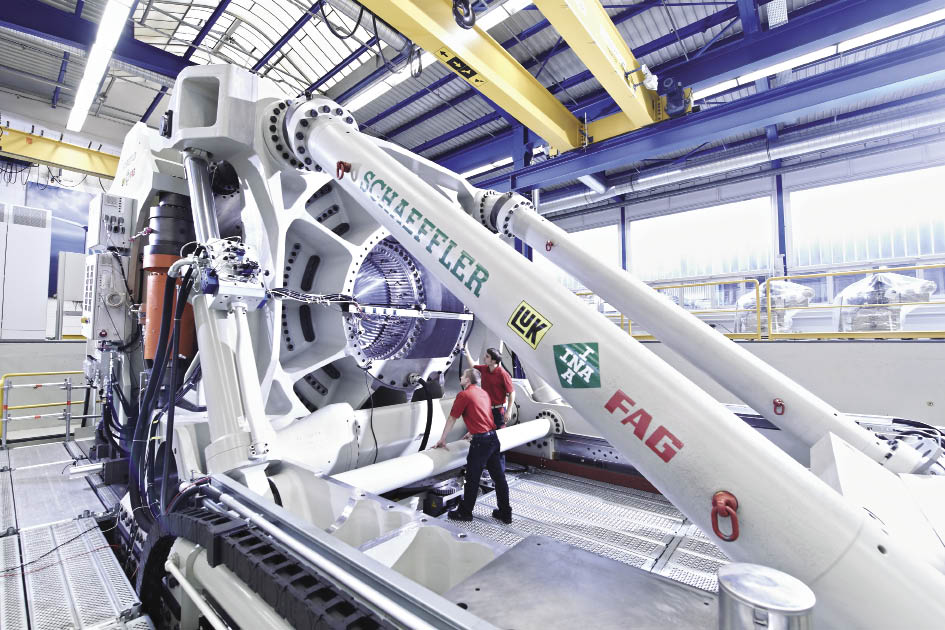 Schaeffler’s large bearing test rig measures 16-m long, 6-m wide, and 5.7-m high, and weighs about 350 tons. The people provide some scale. Schaeffler calls the test rig Astraios after a Titan in Greek mythology and father of the four wind gods.