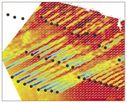 The real-time plot is from a single-Doppler scan and calculated for hub height. Wind shear grows by a significant amount and the wind speed changes with time along with the wake. There is an edge effect along with complex terrain to the upper right of the farm. Notice too the high speed channels between turbines.