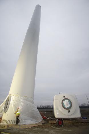 Built by Juhl Energy and owned and operated by ConEdison Solutions, the turbines’ 260-foot towers being assembled during the construction process.