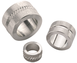 metal compression limiters provide "spot" or local reinforcement of plastic components in high-stress joints typically where components mate.