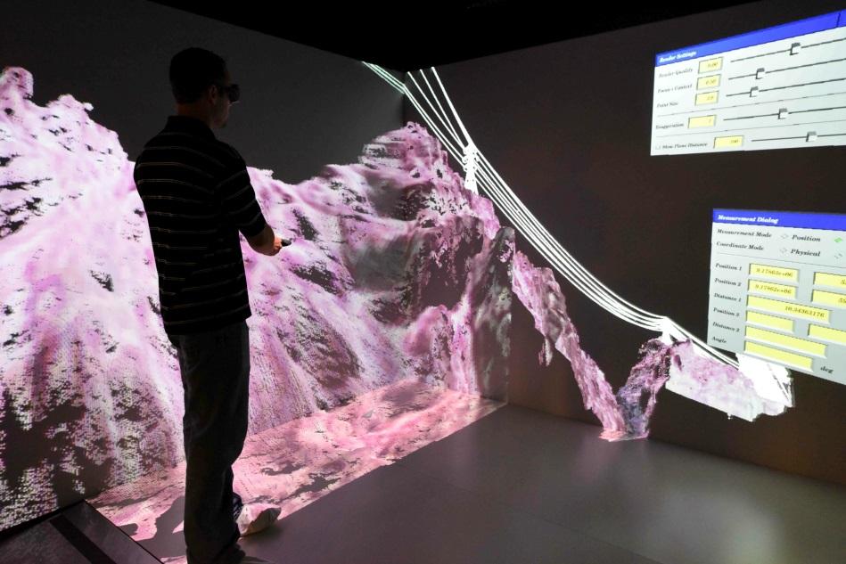 The 3D Computer Assisted Virtual Environment (CAVE) allows visualizing LiDAR scans of overhead transmission lines in complex terrain.