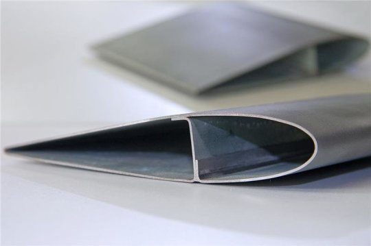 Formed from a 1.0-mm steel sheet and featuring integrated, folded reinforcement, this rotor blade was given its final shape with the help of an oil-water mixture (Source: Fraunhofer IWU)
