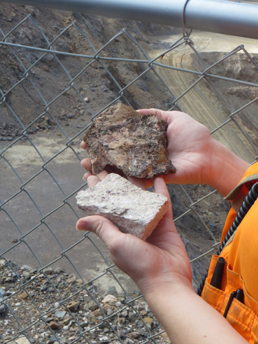Examples of the minerals mined at Mountain Pass, containing 8 to 12% rare earth oxides, mostly contained in the mineral bastnasite. Gangue minerals found include calcite, barite, and dolomite.