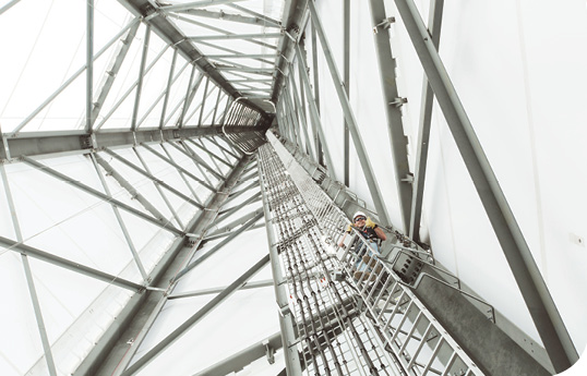 This GE engineer is heading up the ecoROTR’s 97-m space-frame tower, which is also a prototype. It holds one of GE’s most powerful machines, the 1.7-MW wind turbine, and the attached 18.3- m experimental dome.