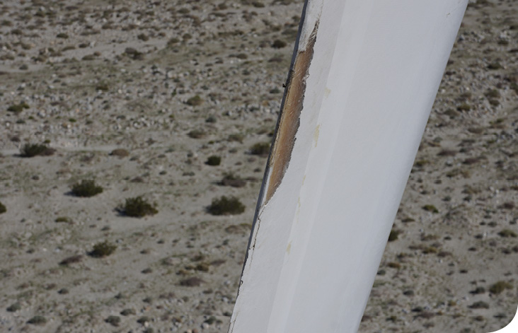 The blade image from AAIR shows sever trainling edge damage. The image is typical for those captured by drone carried cameras.