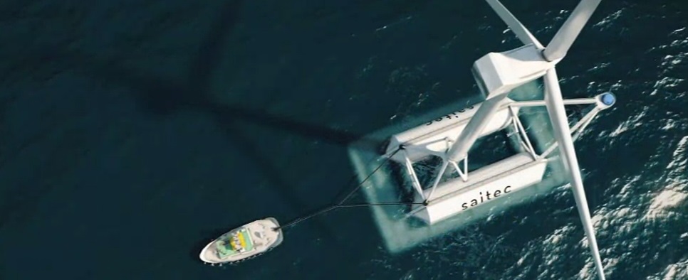 The large flat plate below the floats help stabilize the platform. Only one tug is needed to tow the platform into position.