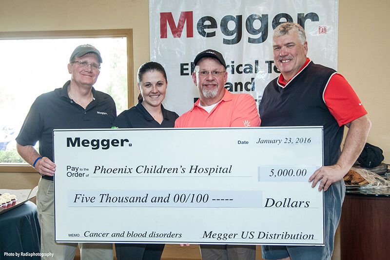 Pictured left to right are Graeme Thomson, Megger VP Sales of U.S. Distribution; Judi Santana, PCH Foundation; David Danner, Megger National Distribution Manager; and Rick Bieber, Megger VP North America. (Photo courtesy of Radiaphotography)