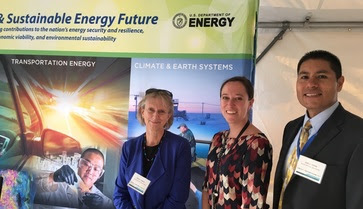 Renewable Systems & Energy Infrastructure Director Carol Adkins (left), Business Development Specialist Amanda Spinney (center), and Senior Manager Juan Torres (right) represent Sandia National Laboratories at the May 2016 EERE Lab Impact Summit.