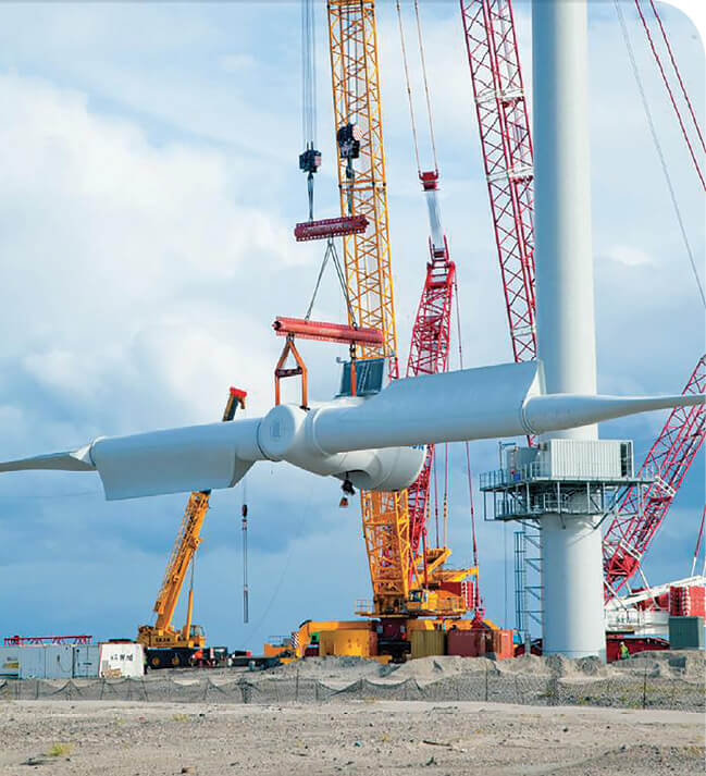 The two blade Envision Energy 3.6 MW turbines also sports two convertors each rated for 1.8 MW. Two blades allow several distinct advantages over conventional designs. For one, the hub and blades can be lifted in one unit which lowers construction costs. And the length of the blade extensions can be customized for particular sites.