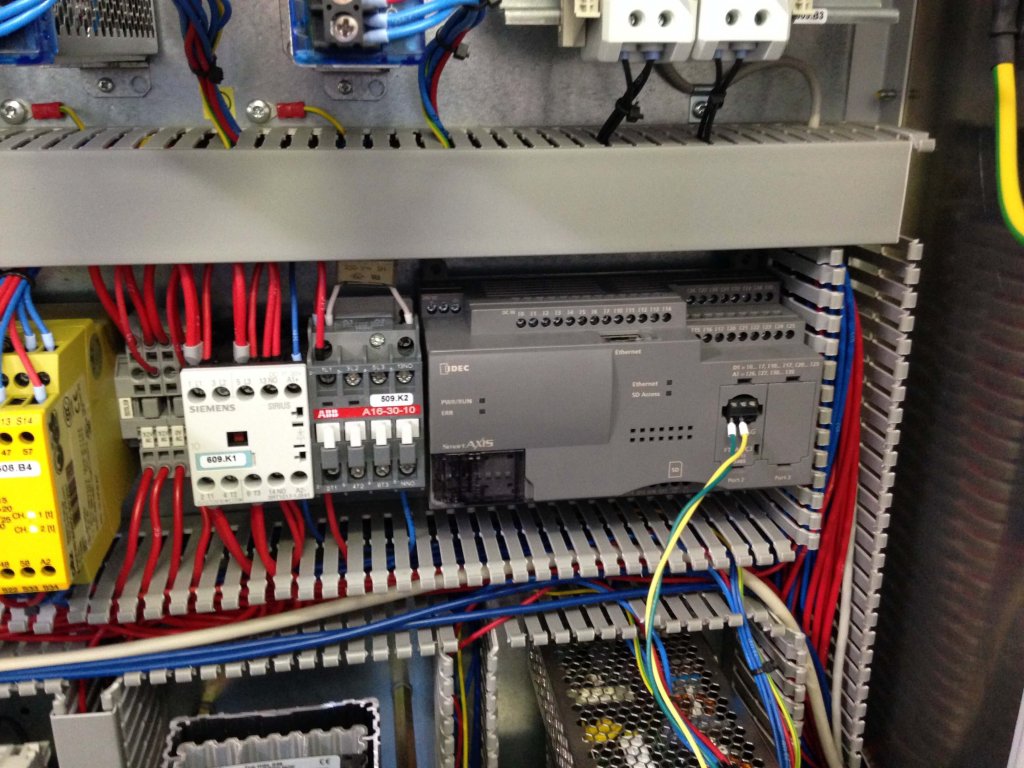 The new IDEC PLC with power supply and the existing turbine controller, all fit into a wind turbine’s nacelle.