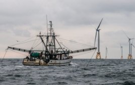 Offshore fishing boat near wind farm (Deepwater Wind)