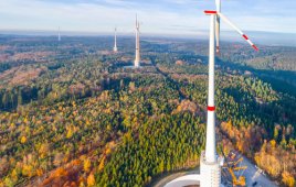 The pilot project in Germany’s Swabian-Franconian Forest features wind turbines mounted on bases that will serve as water reservoirs, effectively increasing tower height by 131 ft for a peak rotor reach of 807 ft above ground.